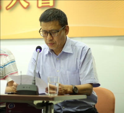 黃國基副理事長宣讀修改會章報告
